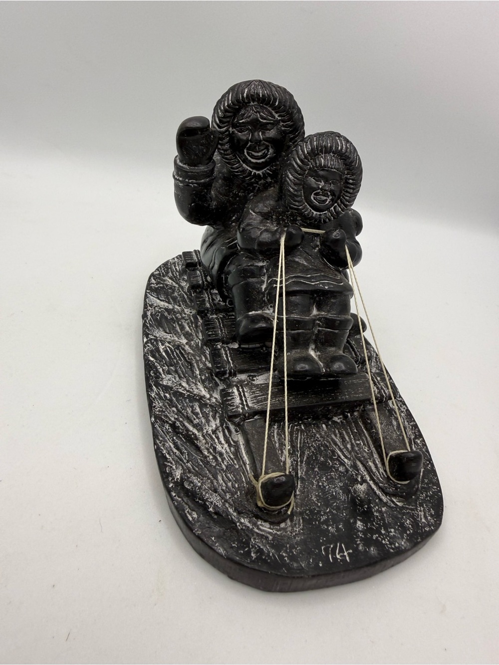 Handcrafted Black Inuit Sledding Sculpture - Decorative Home Art Accent